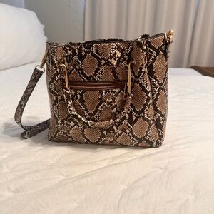 Crossbody or hand bag.